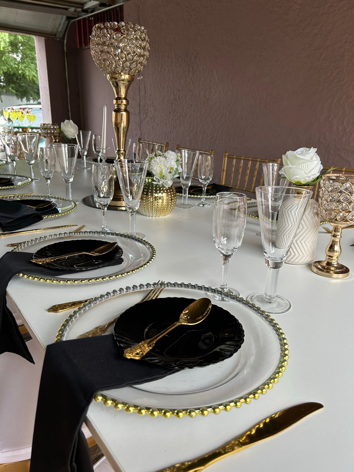 Gold and black glam place setting
